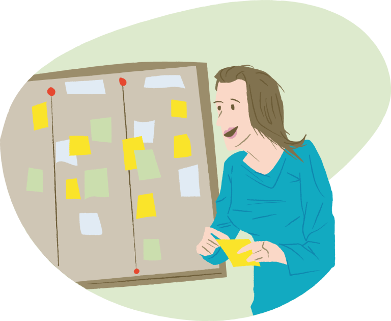 En person henger en lapp opp på en tavle